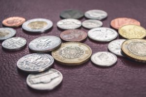coins displayed on a surface coins displayed on a surface