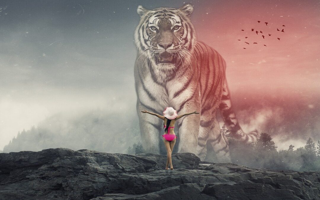 A tiger approaches a woman in a bikini