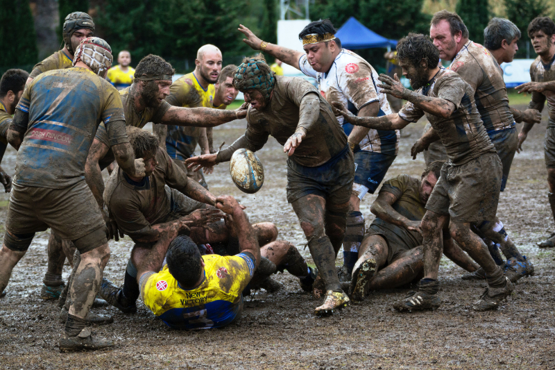 Muddy rugby players